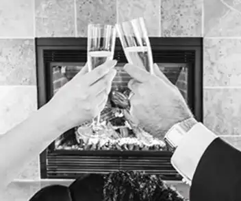 Photographer capturing a photo of champagne glasses
